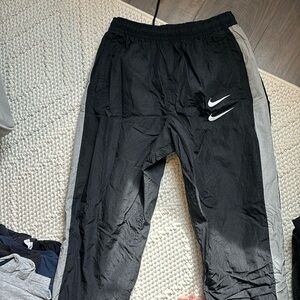 Double swoosh large Nike wind breaker pants